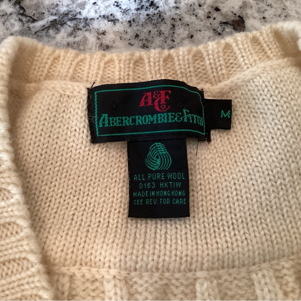 Mens sleeveless tennis sweater.